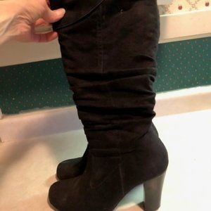 Heeled black suede 3/4 boots.